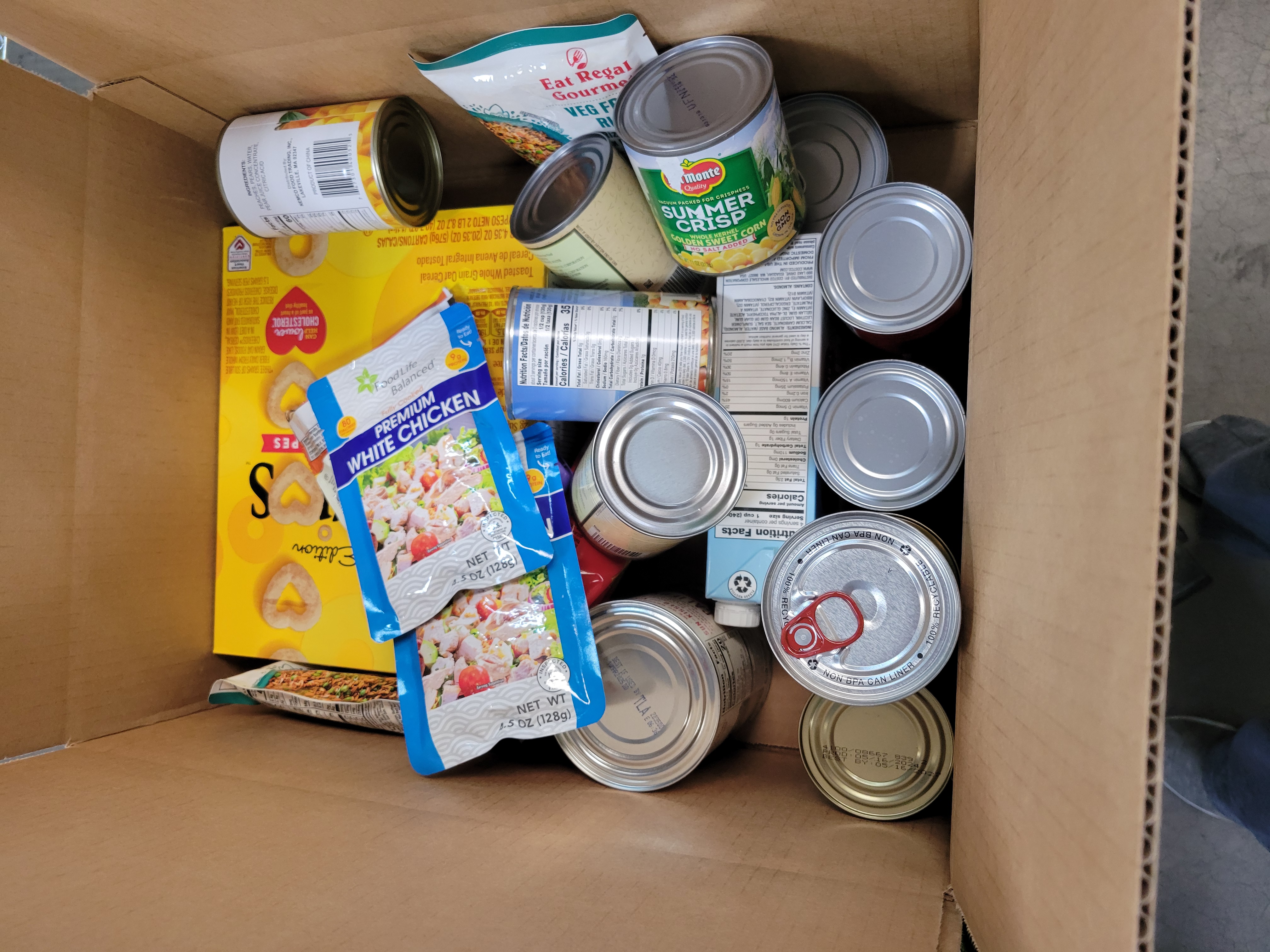 Dry goods filled cardboard box.